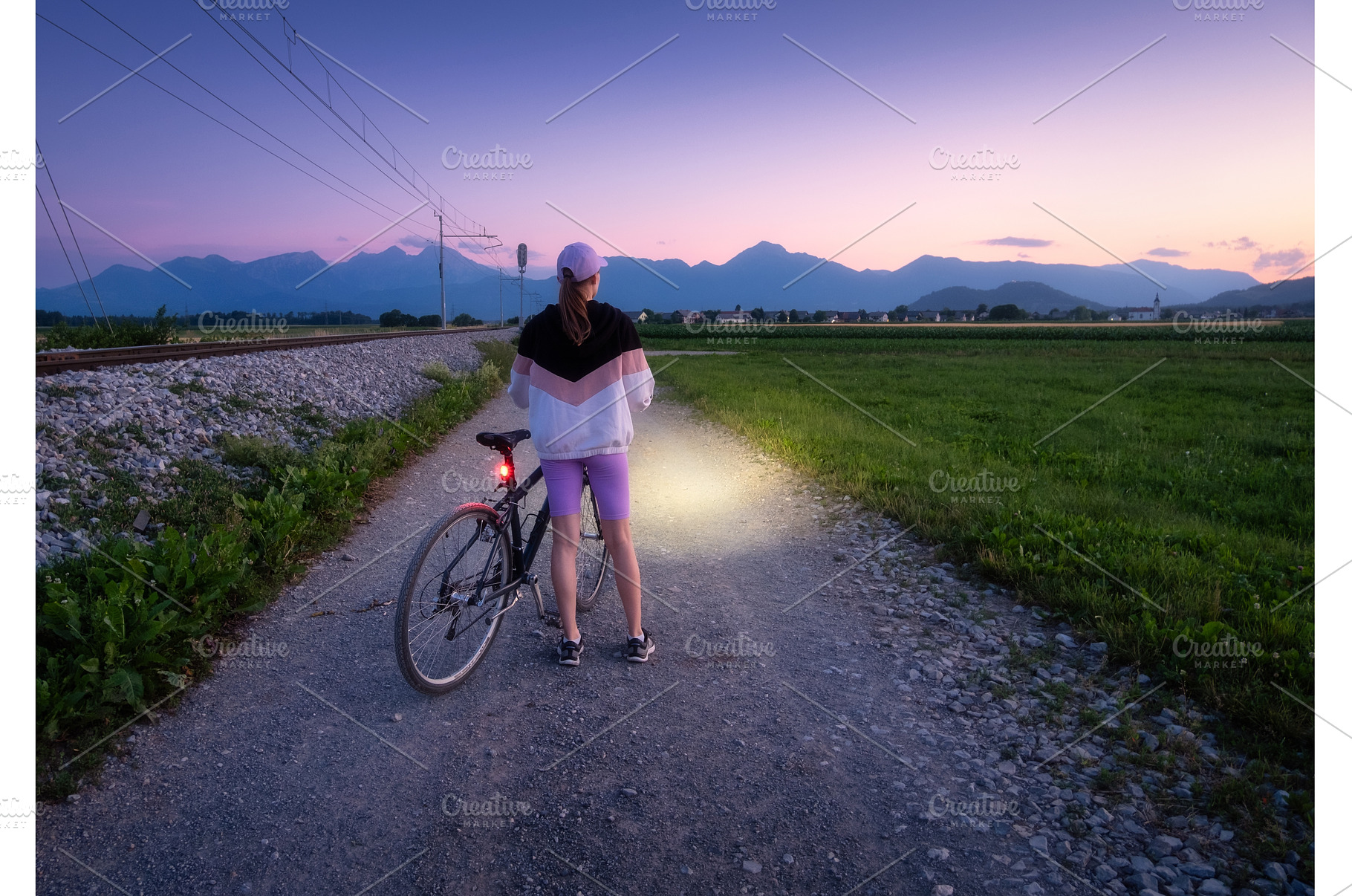 Woman is standing with mountain bike, a Sports & Recreation Photo by den-belitsky