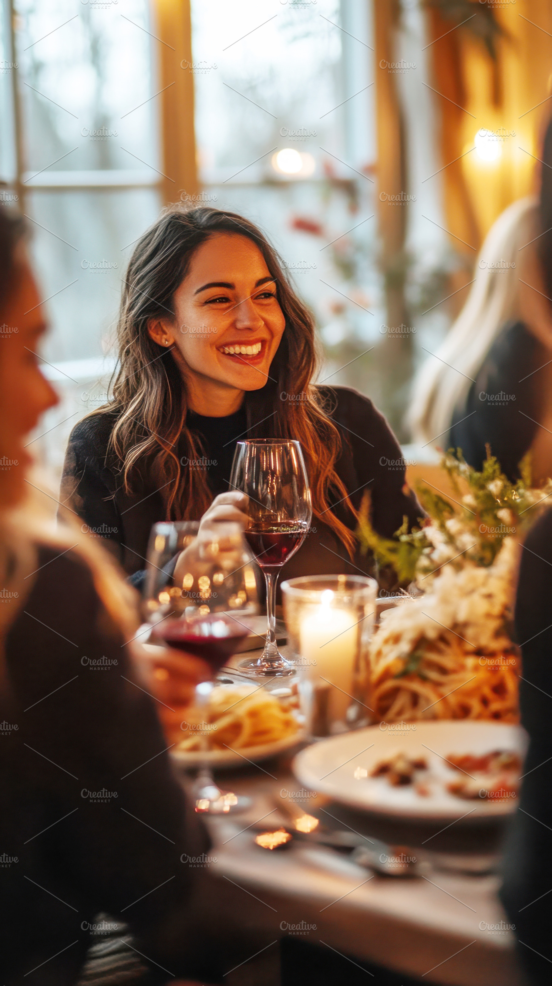 Friends enjoying dinner and laughter, a Photo by Beautiful things