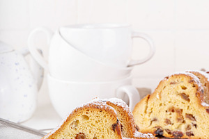 Christmas stollen, traditional festive fruit cake, a Food & Drink Photo by Rimma