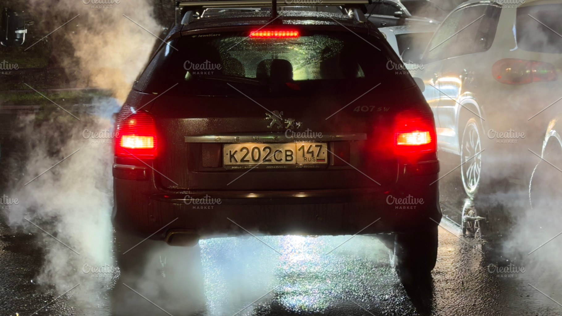 A dark car with fog and steam rising from the ground at night, illuminated by r, an Industrial Photo by Textures & Backgrounds