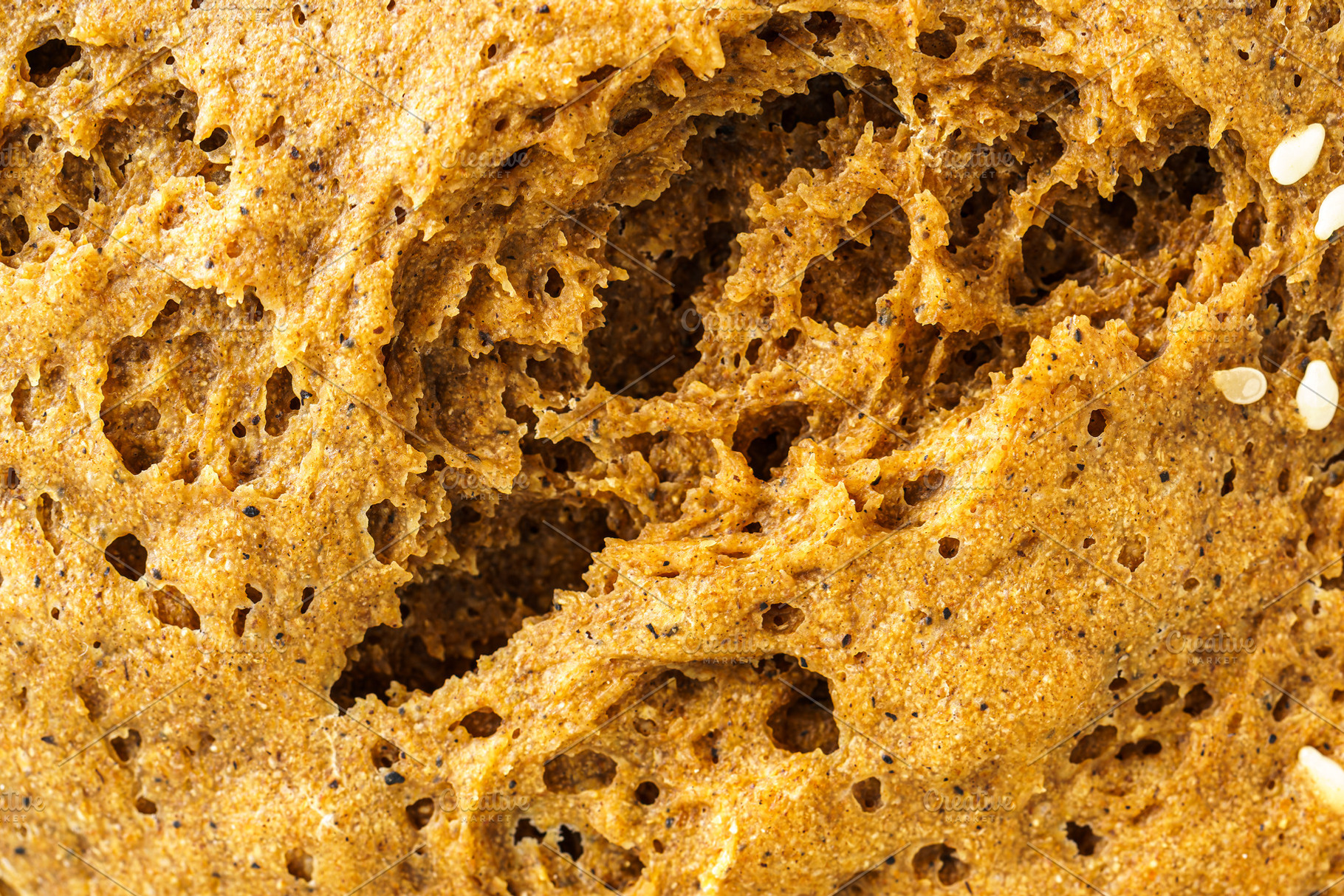 Close detailed macro view of wholesome whole grain bread texture showing the po, a Food & Drink Photo by Eugene_Photo