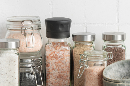 Jars with assorted speciality salt, a Food & Drink Photo by Olena Rudo