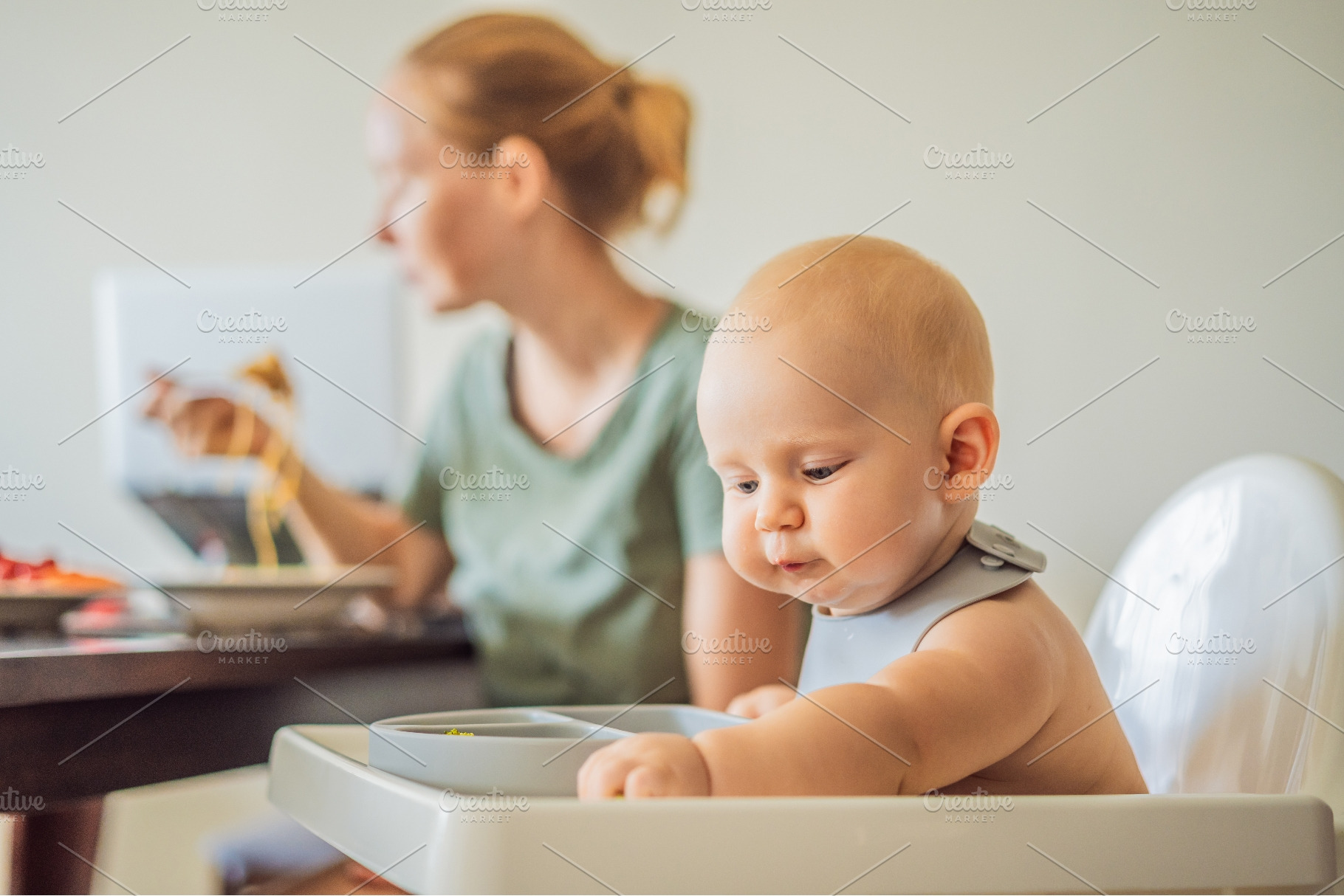 Infant learning independent eating, a Person Photo by Elizaveta Galitskaya