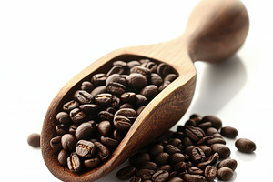 Roasted coffee beans in a wooden sco, a Food & Drink Photo by Pixeness Studio