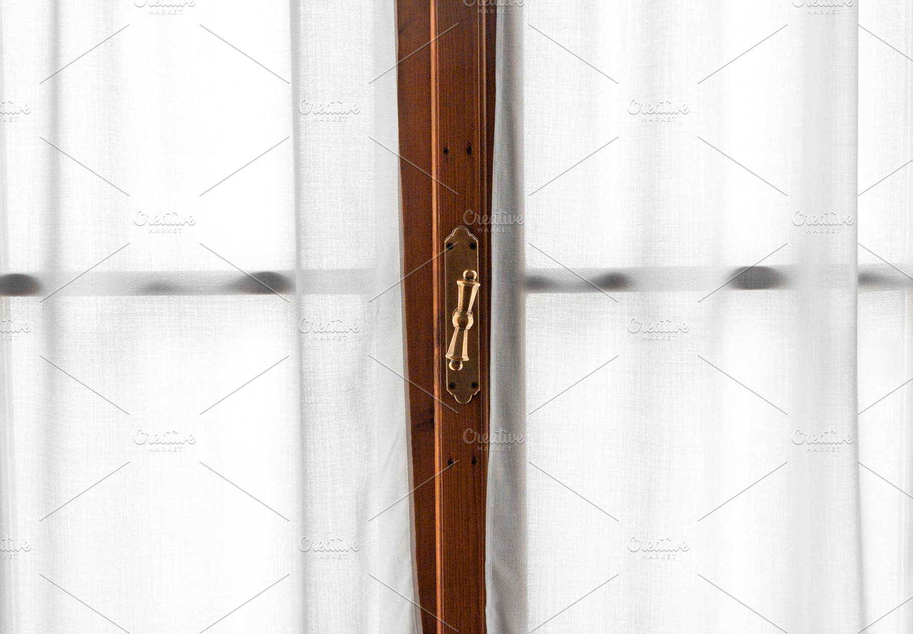 Window frame with retro handle, an Architecture Photo by BOOCYS