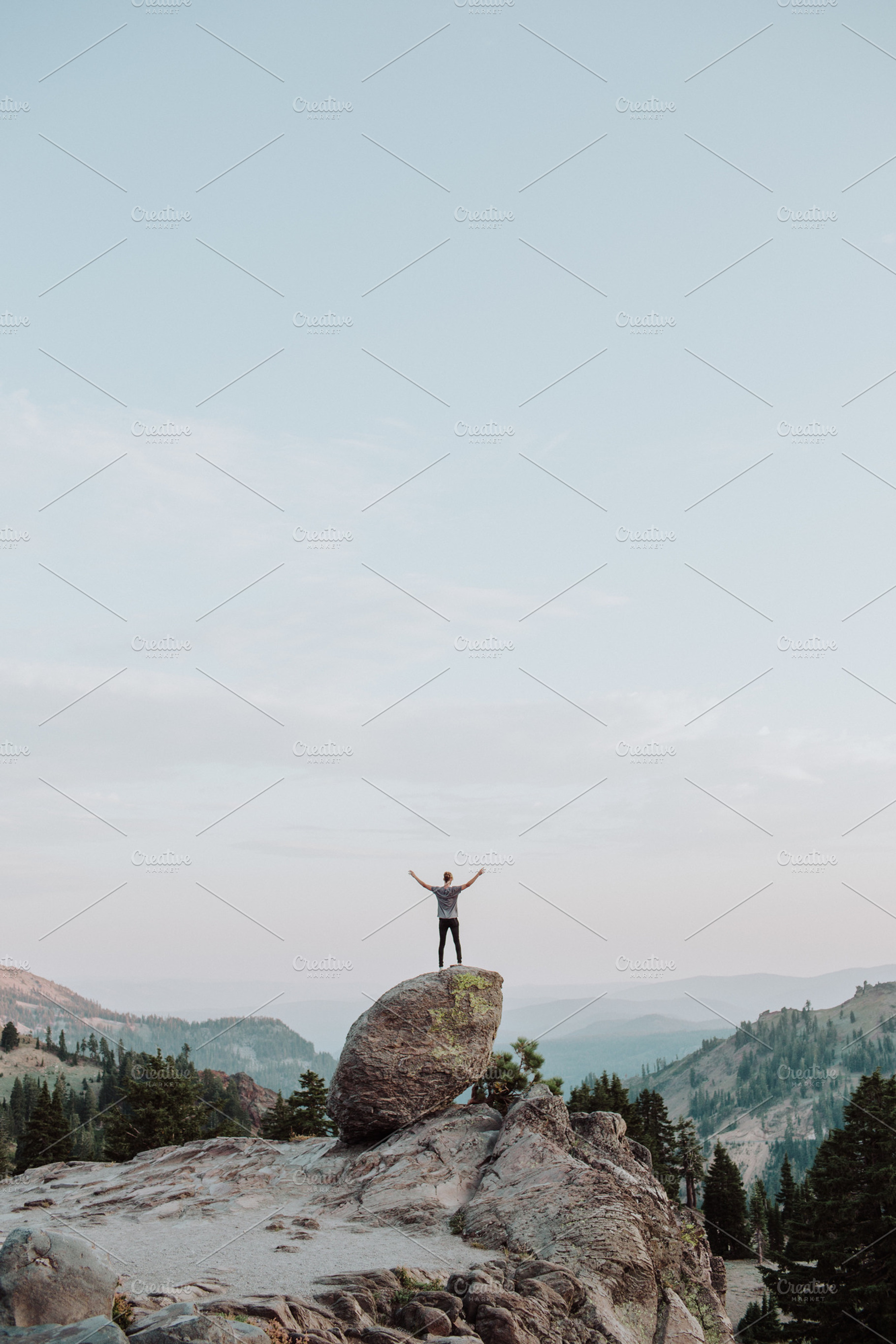Hands up containing outdoor, nature, and exploring, a Person Photo by Hannah Posey