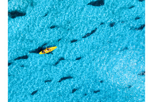 Aerial view of a kayakers paddling, a Nature Photo by den-belitsky