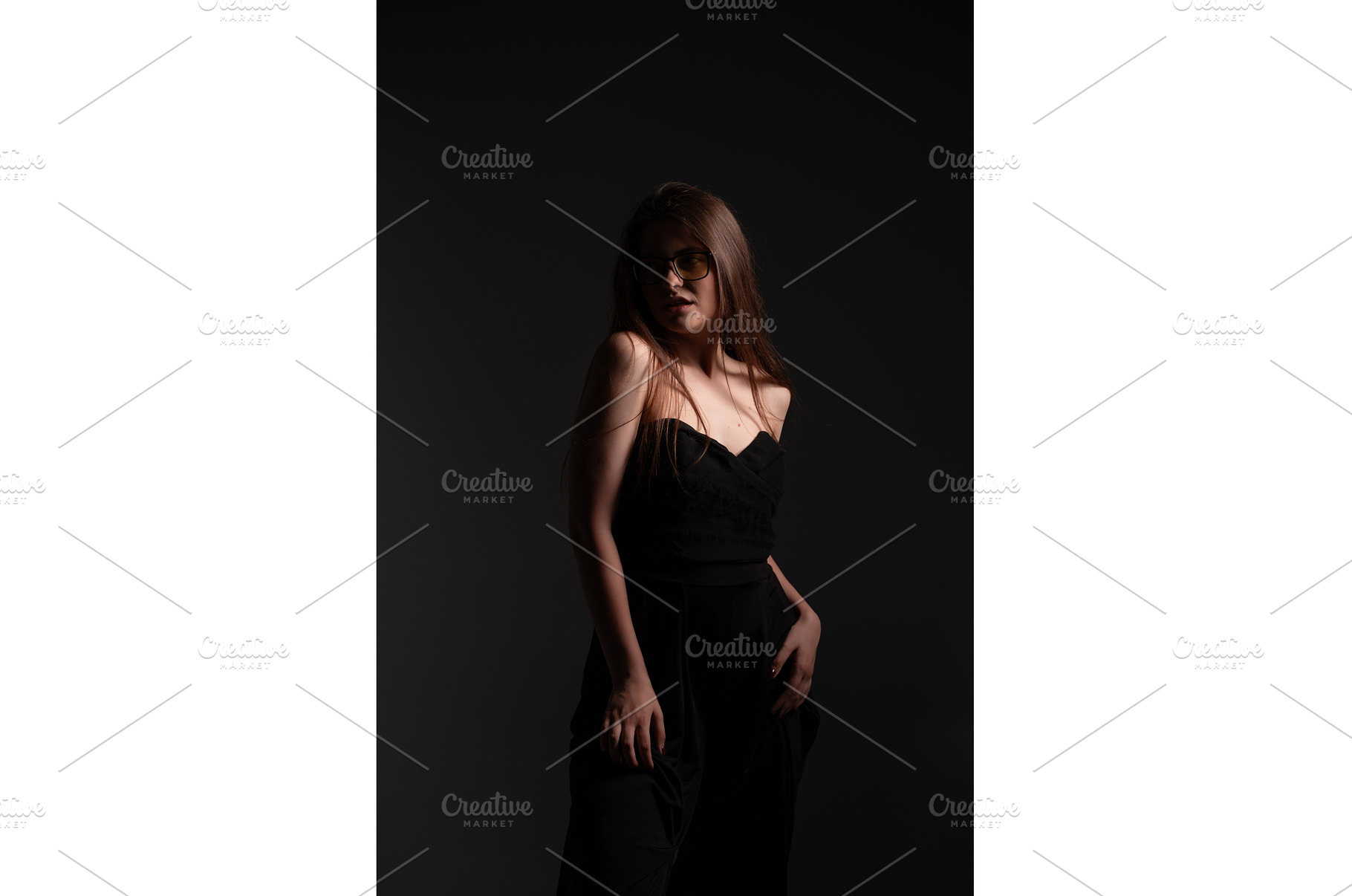 Elegant young woman wearing black, a Person Photo by volodymyrshtun13795