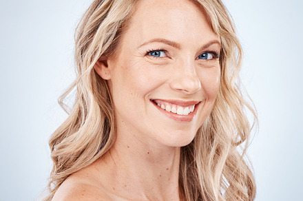 Beauty, skincare and hair care wellness of a woman happy about salon or facial treatment. Portrait of a model face smile with happiness about healthy hairstyle, balayage and cosmetic dermatology, a Photo by Peopleimages.com