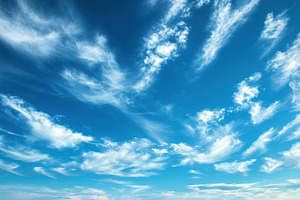 Blue sky filled with whispy clouds,, a Photo by Pixeness Studio
