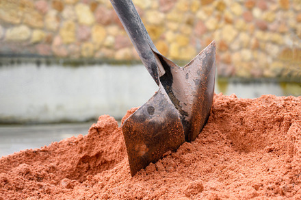 Pile Of Sand And Shovel For Construc, an Industrial Photo by david.herraez.calzad