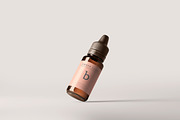 Amber Glass Dropper Bottle Mockups, a Cups & Container Mockup by pmvch (Thumbnail 13 of 20)
