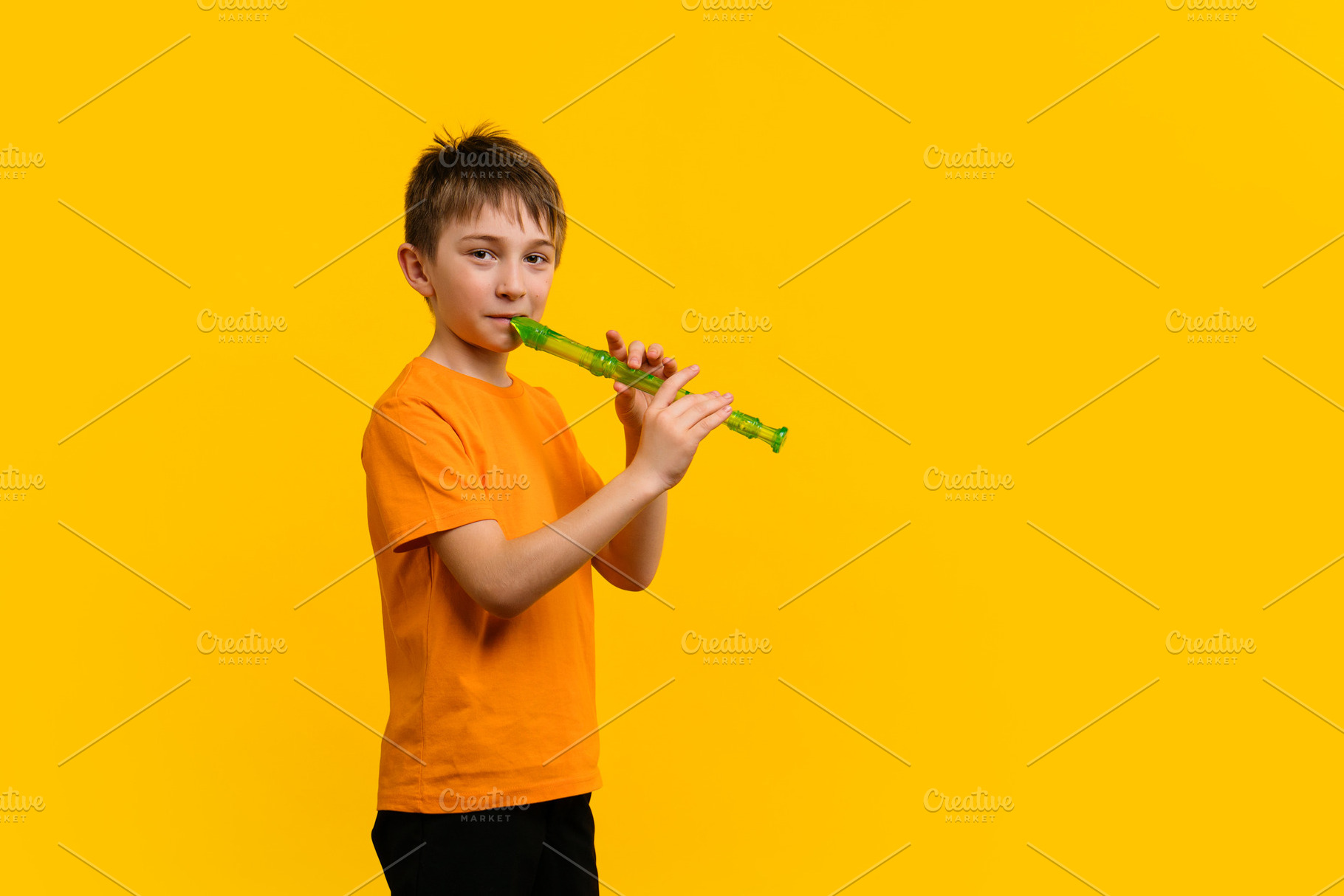 Boy with blockflute in studio, a School & Education Photo by Elena Vagengeim