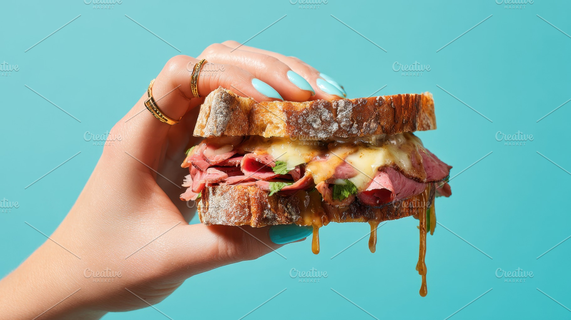 Hand with meat and cheese sandwich, a Photo by Beautiful things