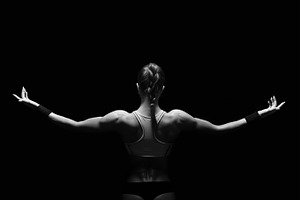 Athletic young woman showing muscles stock photo containing active and adult, a Sports & Recreation Photo by sport&beauty stock photo