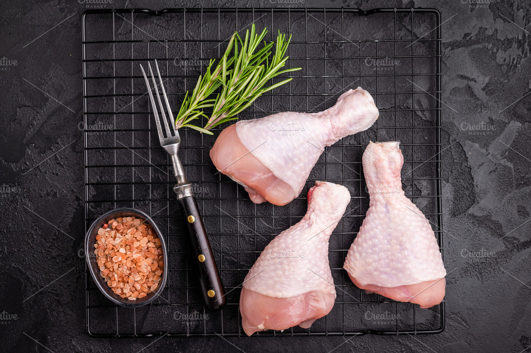Raw chicken legs drumsticks, perfect for roasting or frying, off, a Food & Drink Photo by composter-box@mail.ru