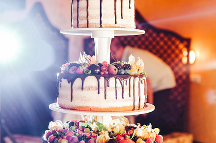 Wedding cake with strawberries blac stock photo containing cake and wedding