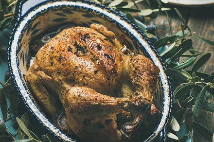 Whole roasted chicken decorated with containing chicken, roasted, and whole, a Food & Drink Photo by Foxys