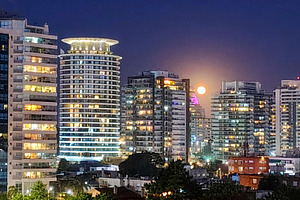 Apartment buildings night urban scene, punta del este city, urug, an Architecture Photo by DanFLCreativo