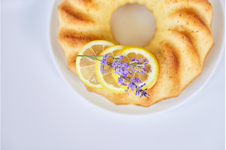 Top view of lemon cake on white, a Food & Drink Photo by IlliaBondarPhotography