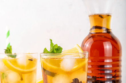 Iced tea cocktail drink, cold summer drink with black tea, a Food & Drink Photo by Rimma