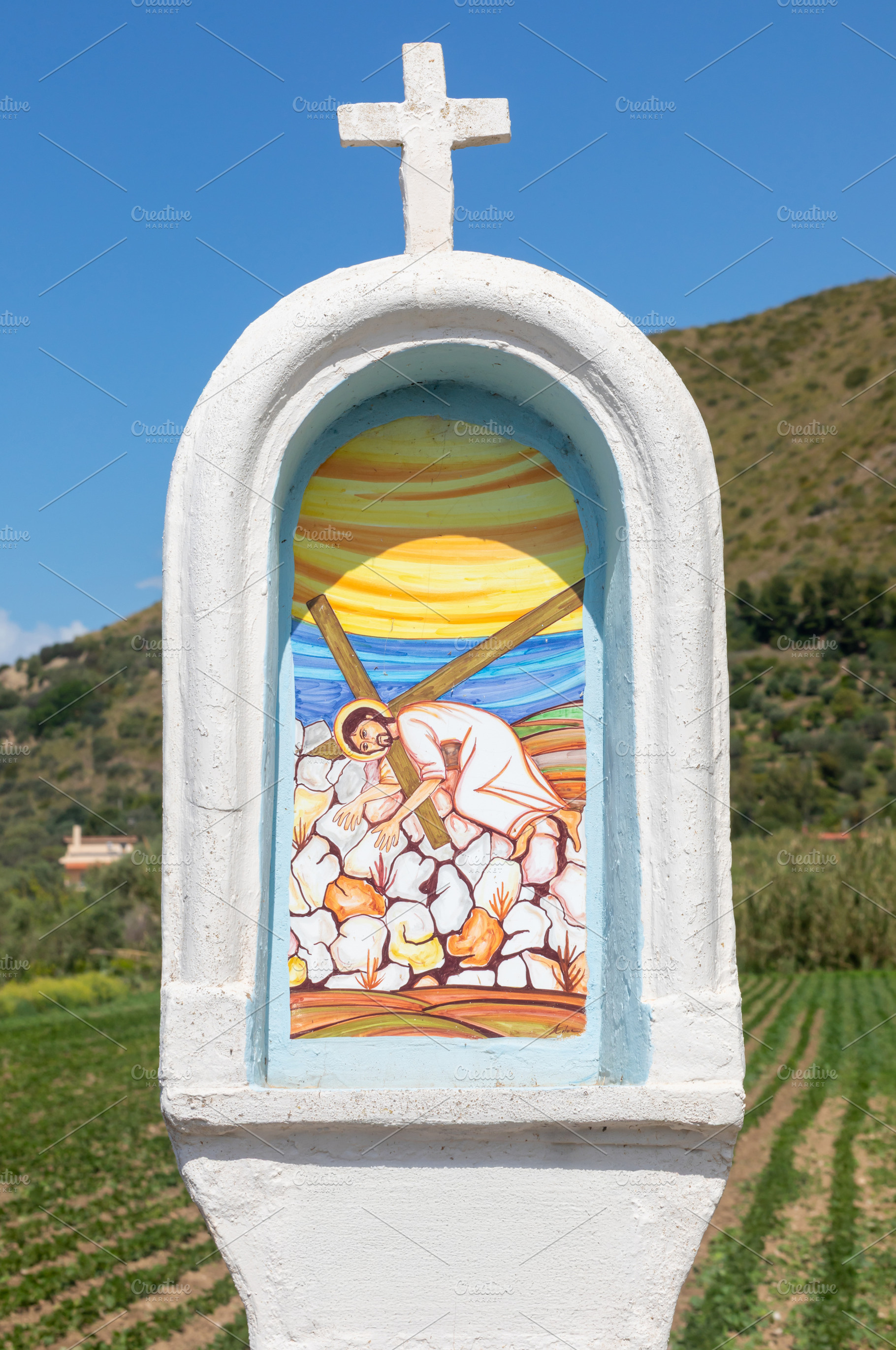 Votive shrine representing Jesus carrying the cross during his passion, a Photo by Antonio Gravante Market