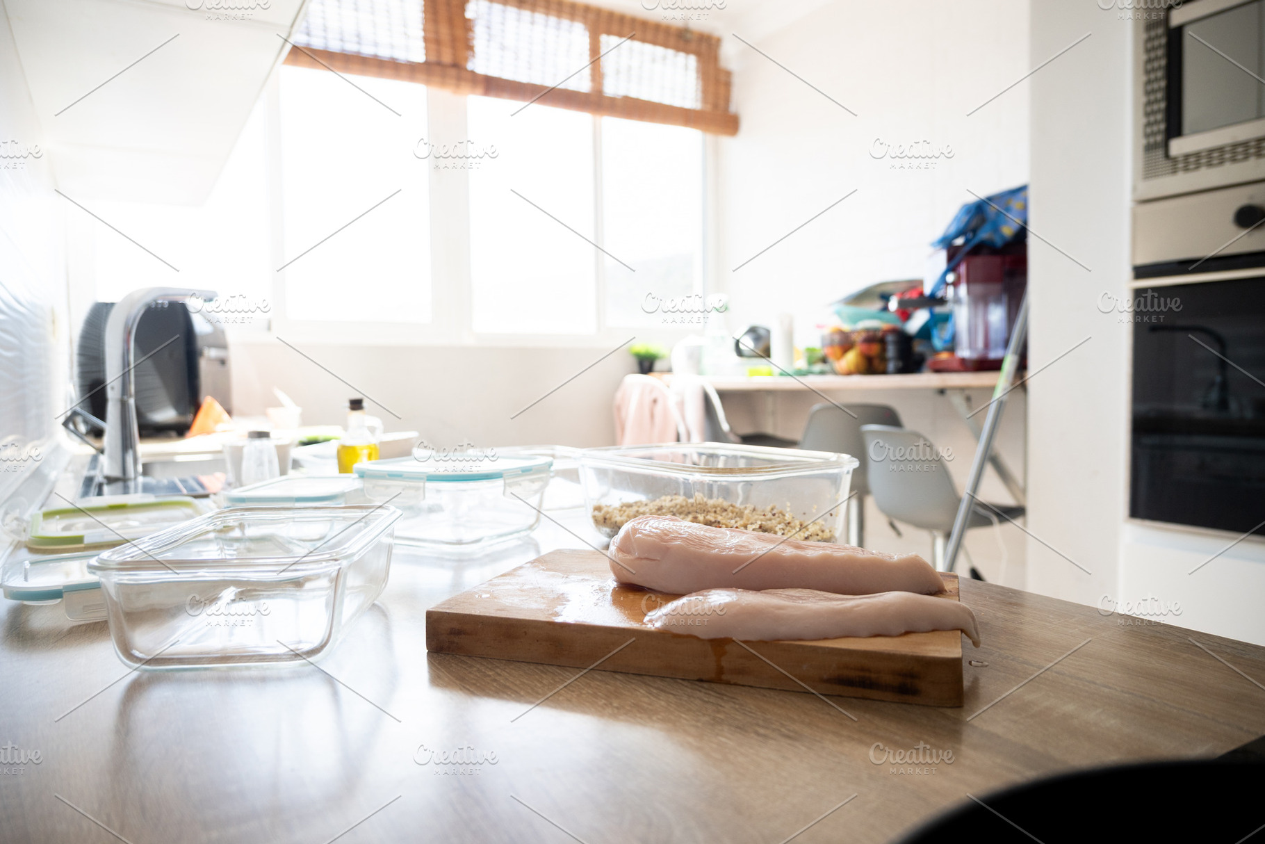 Raw Chicken Breasts and Food Containers in Home Kitchen, a Food & Drink Photo by etorres69