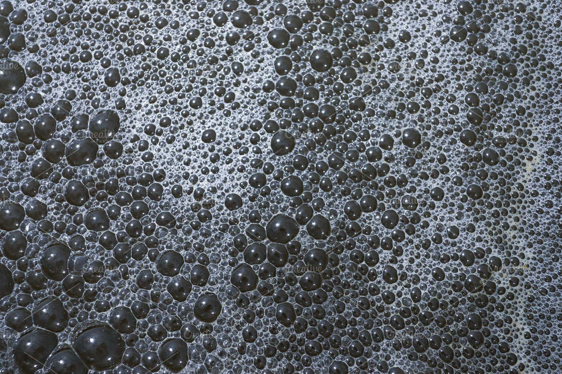 Close-Up of Soap Bubbles Forming Abs, an Abstract Photo by bastera