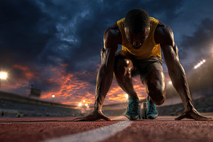 Powerful Athlete Ready to Sprint at, a Photo by Pixeness Studio