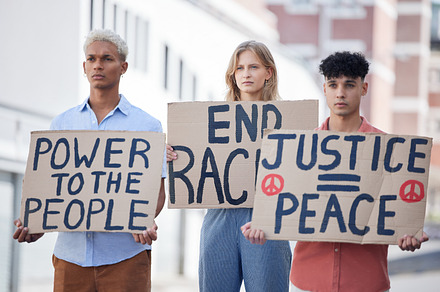 Protest, crowd and poster of peace, racism and justice in city street rally, fight and human rights freedom rally. Community group, society and people revolution sign, power and blm equality support, a Photo by Peopleimages.com