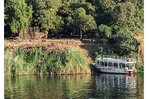 Passenger ferry docked by the River, a Transportation Photo by Backyard Stock