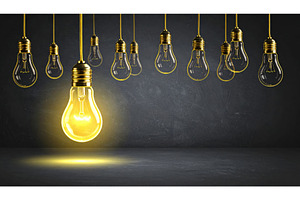 Bright yellow light bulb glowing, a Technology Photo by Igor Tichonow
