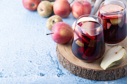 Autumn sangria with pear and apple on wooden table, a Food & Drink Photo by etorres69