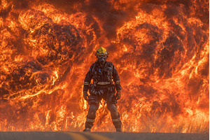 Firefighter making efforts to, a Person Photo by ZinetroN