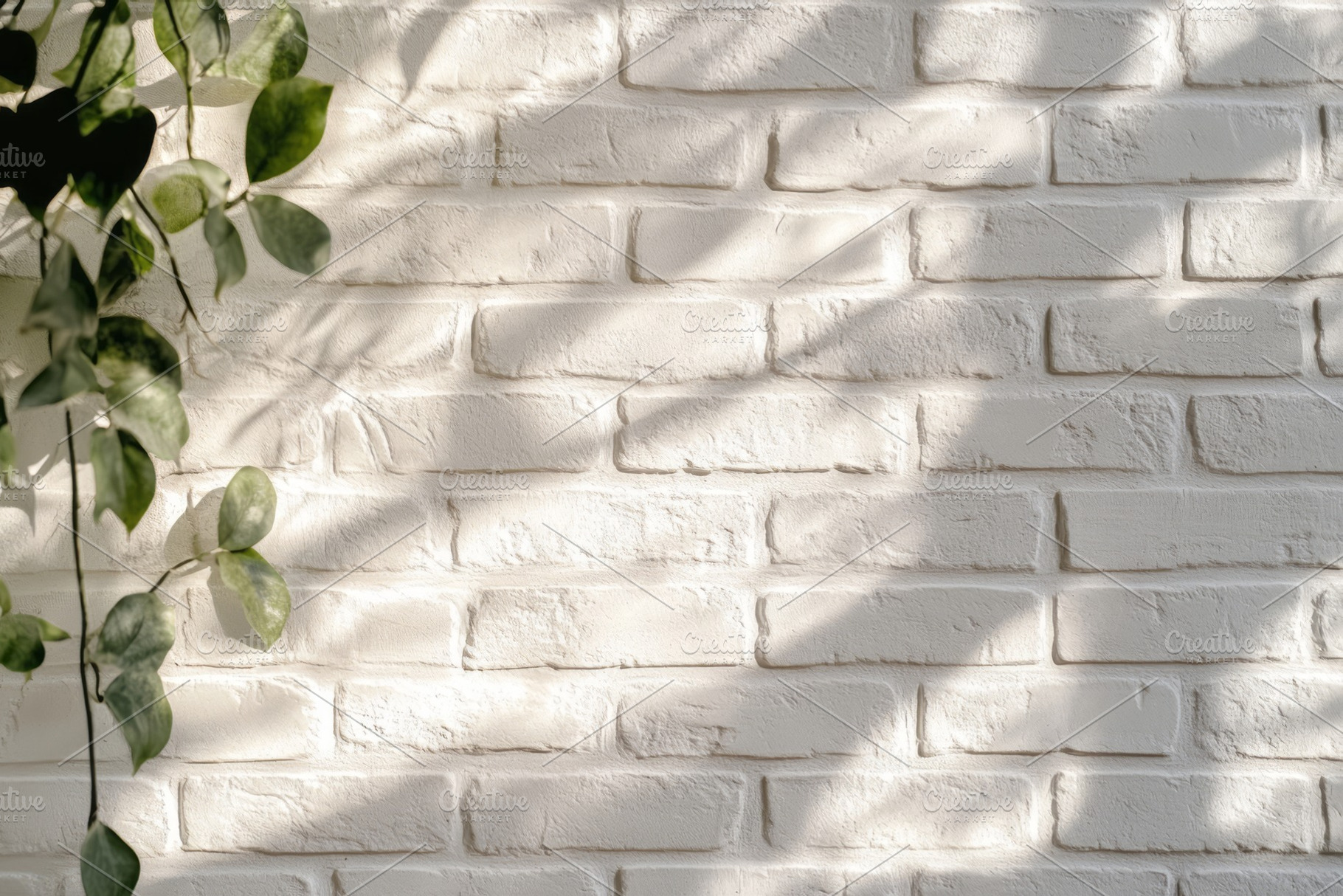 A serene white brick wall adorned with lush green foliage creating a calming at, a Background Photo by ImageMir