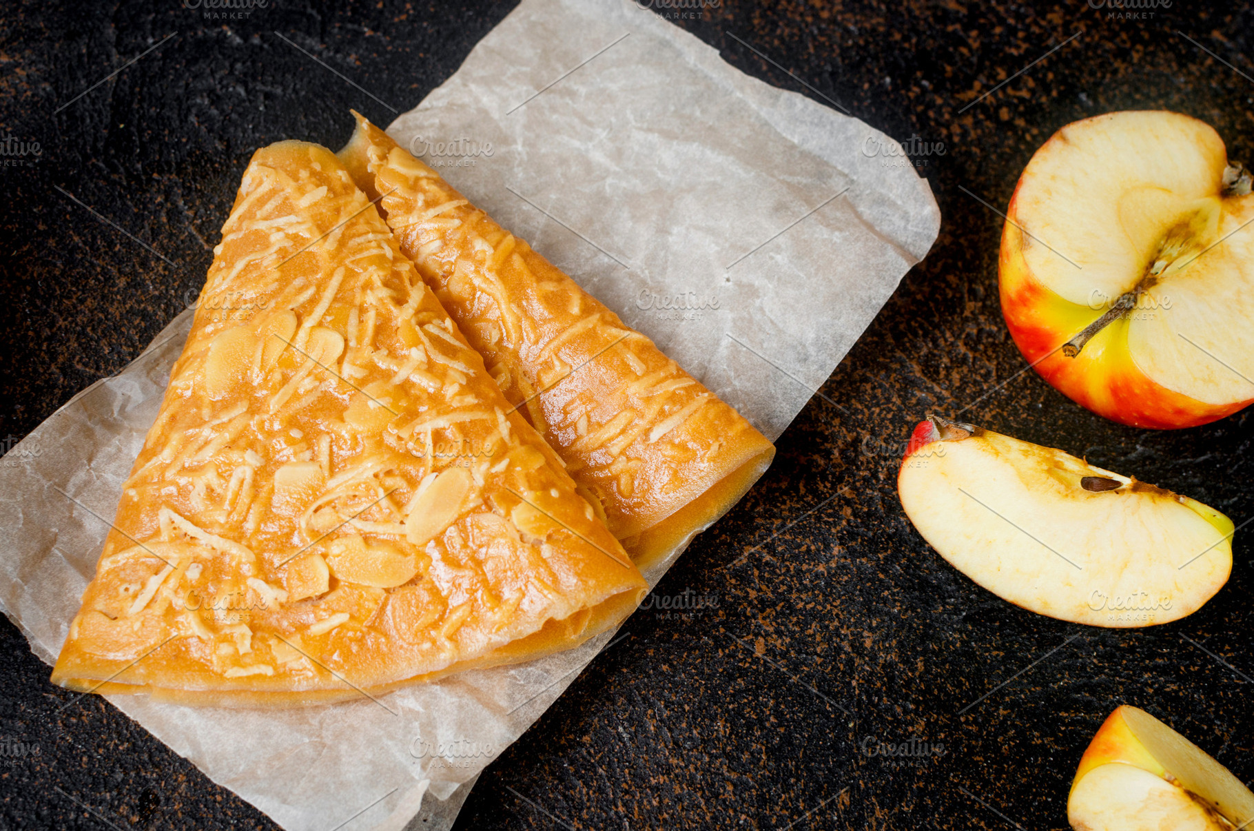Delicious apple fruit leather on a board, a Food & Drink Photo by vimart
