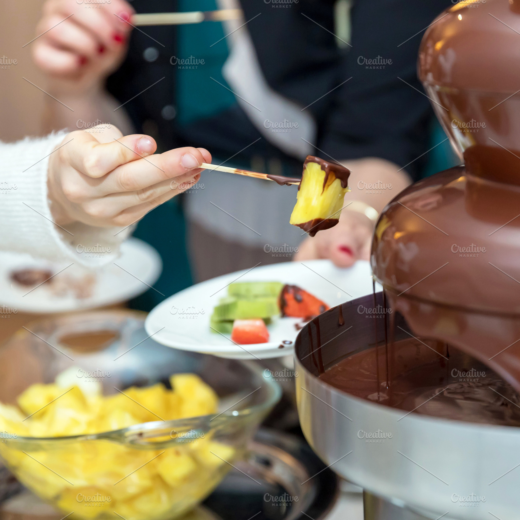 Vibrant chocolate fountain, a Food & Drink Photo by KYNA STUDIO