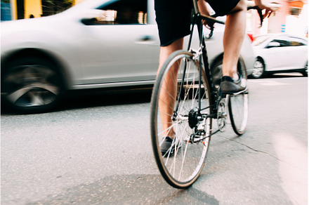 Man start riding on bicycle in city, a Sports & Recreation Photo by Photo Drive Studio