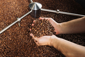 High angle of male hands with beans
