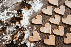 Christmas baking gingerbread hearts containing bokeh, christmas, and