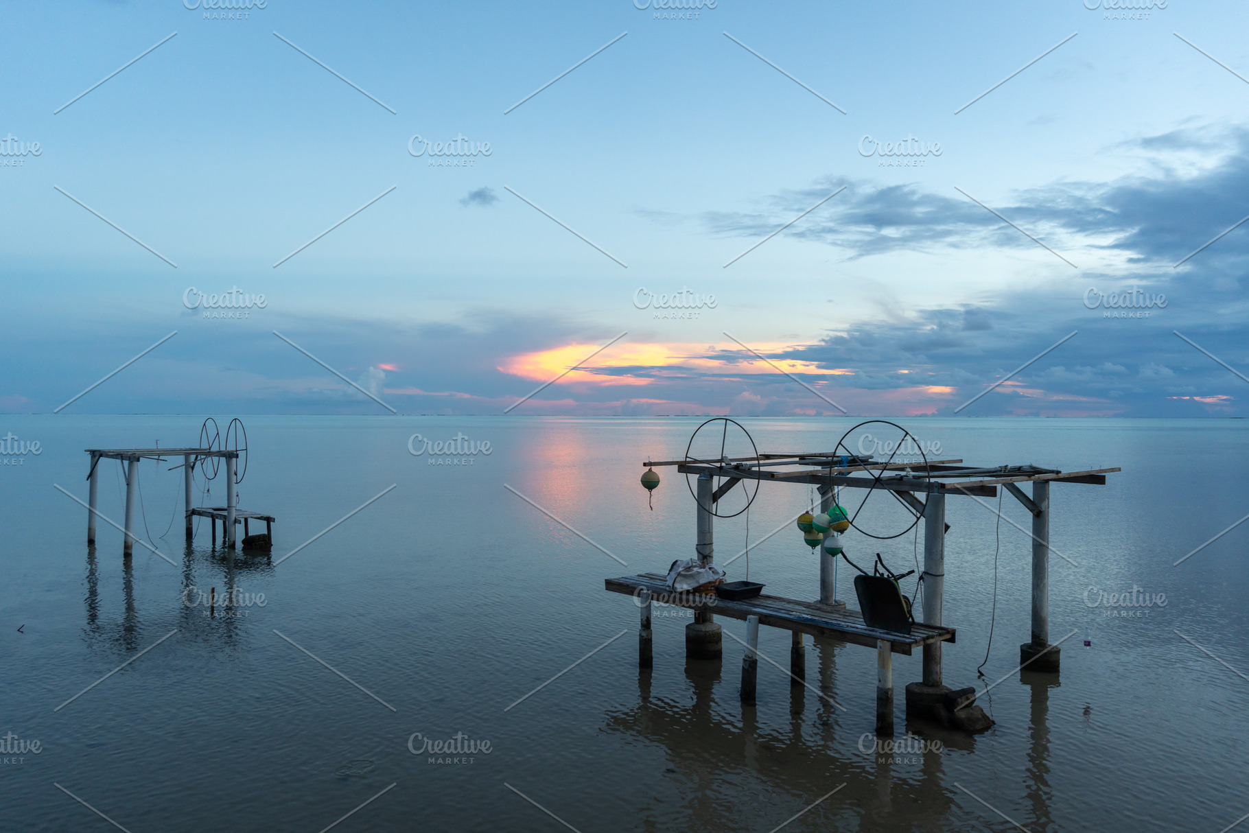 Sunrise over the peaceful lagoon of Maupiti, French Polynesia, a Nature Photo by GoodGoods