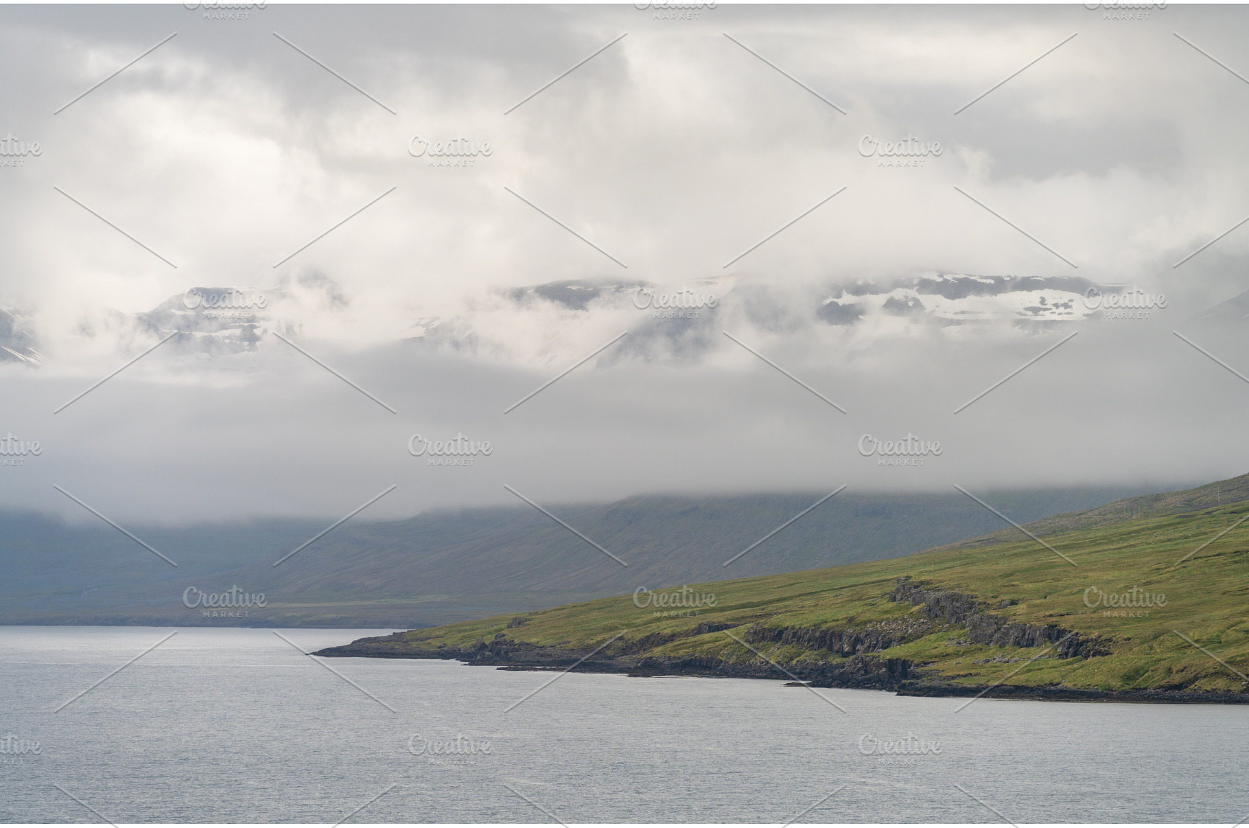 Low clouds over the mountains, a Nature Photo by Backyard Stock