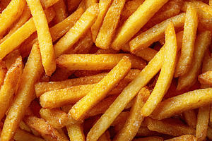 Crispy fried french fries served on a rustic wooden surface during a sunny outd, a Background Photo by AlyaAnd