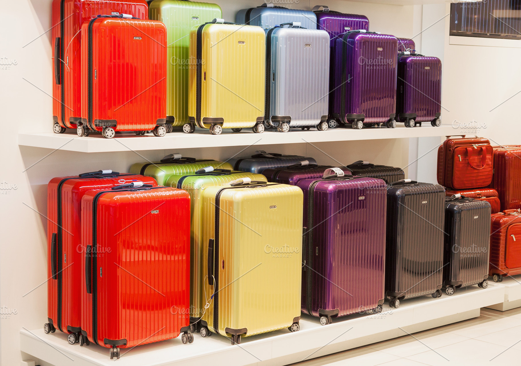 Colorful metallic luggage bags, a Beauty & Fashion Photo by BOOCYS