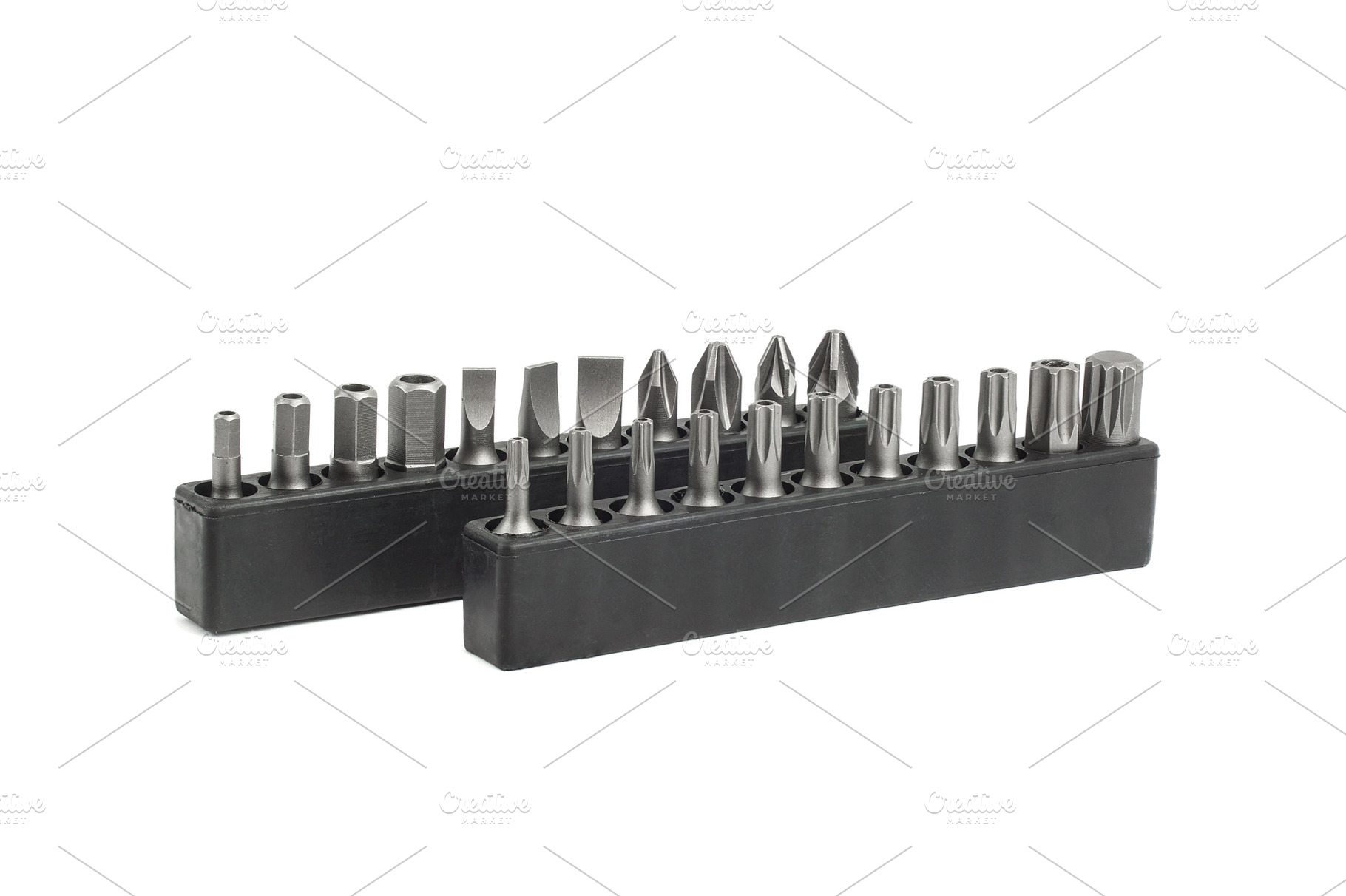 Screwdriver bit set close-up, white, an Industrial Photo by AlexBush