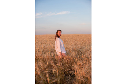 Woman in White Shirt at Sunset in, a Person Photo by Jan Jack Russo Media