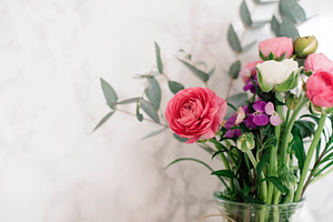 Flowers in vase featuring flowers, vase, and marble