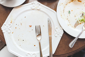 Empty dirty plate left after dinner