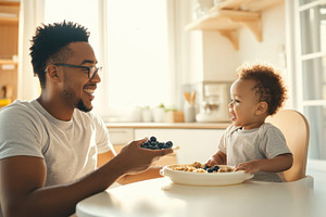 Dad and child have breakfast, a Photo by Beautiful things