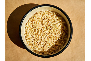 Cooked instant noodles served on, a Food & Drink Photo by Gladkov photography
